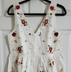 J. CREW PEPLUM HAND EMBELLISHED FLORAL TOP